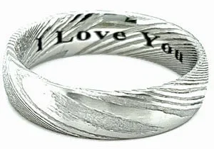 Engraved Damascus steel woodgrain ring