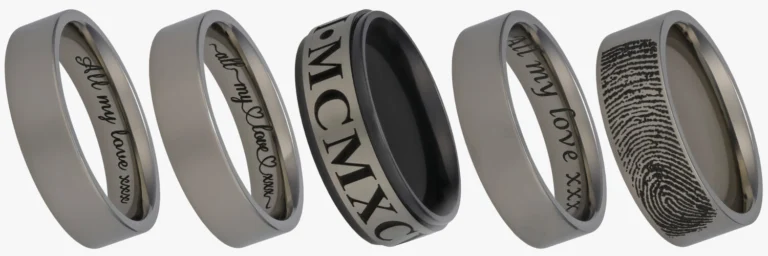 5 Laser Engraved Rings in a line showing engraving examples