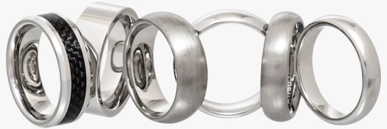 Cobalt rings in polished and brushed finishes including one with black carbon fibre inlay